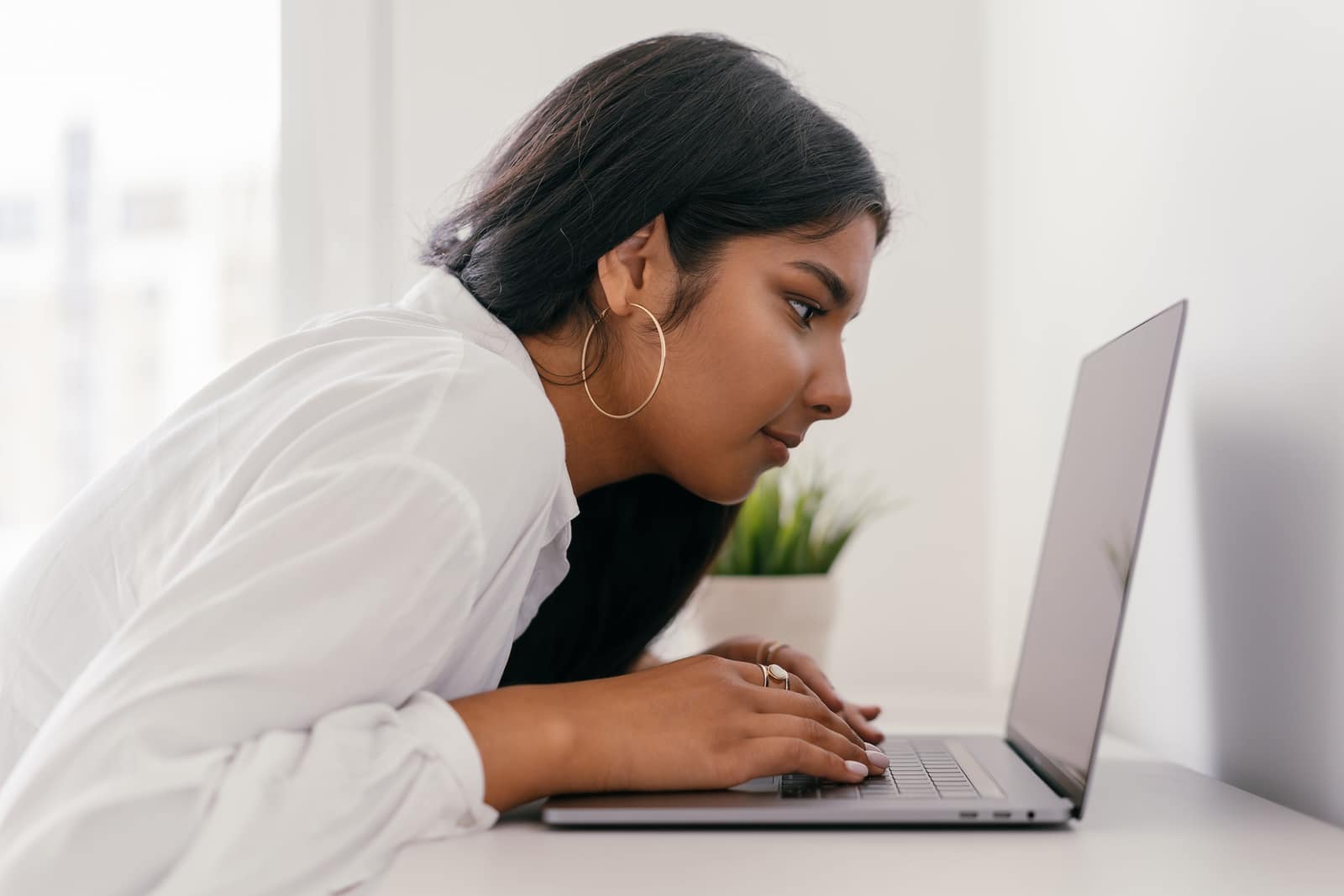 A learner working through material on a laptop