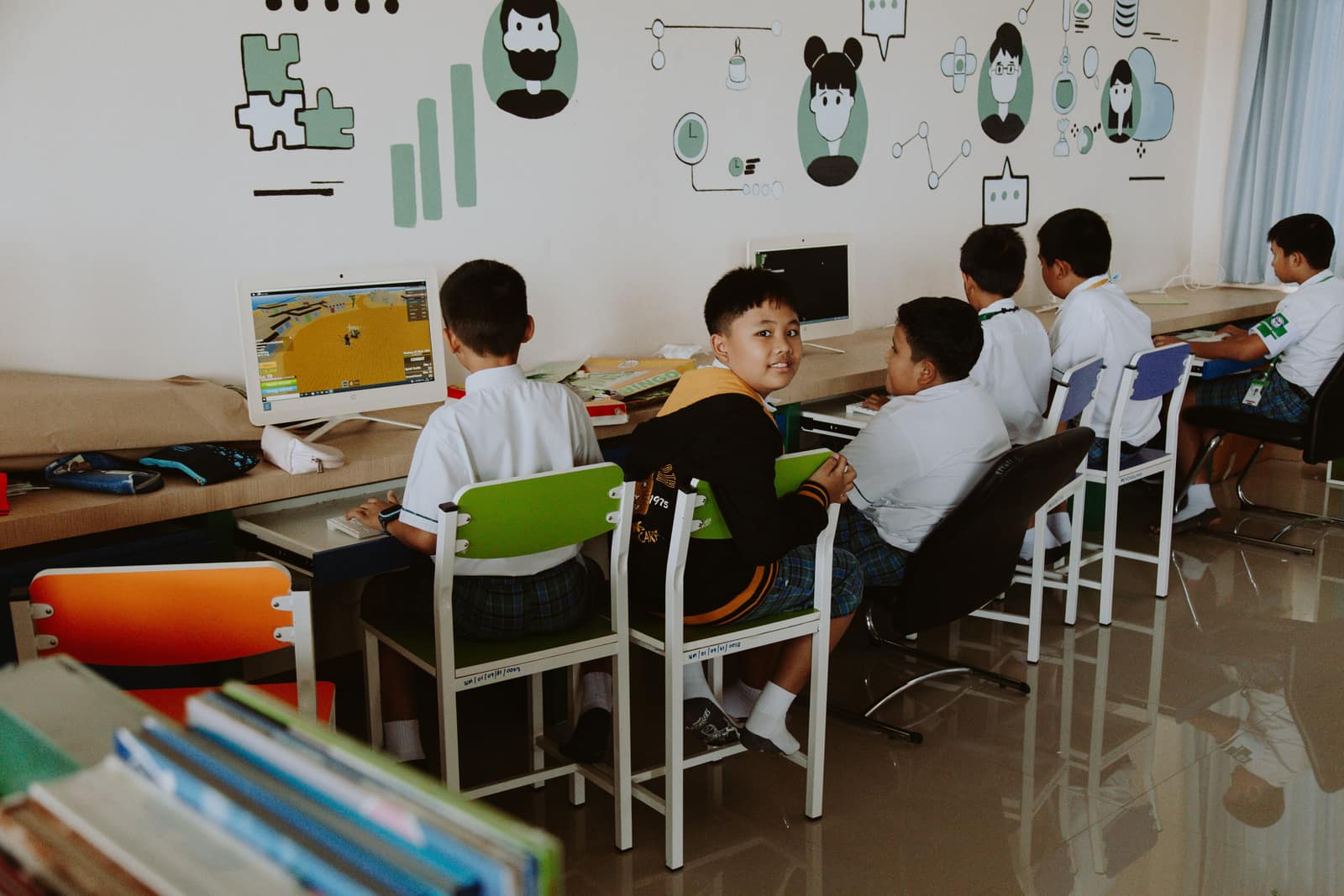 School students working at computers in a classroom